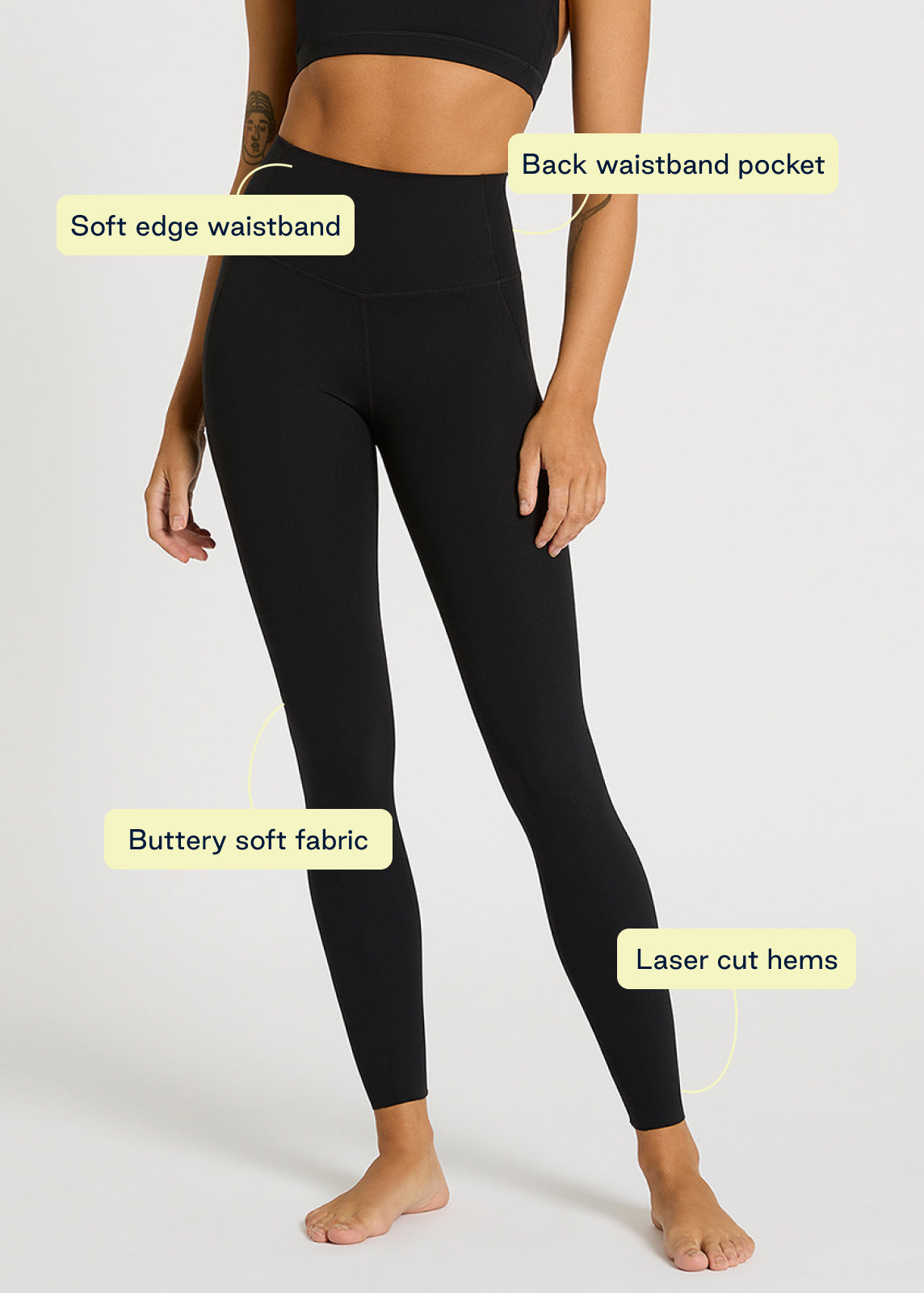 Black leggings with soft-edge waistband, laser-cut hems and hidden back pocket labels